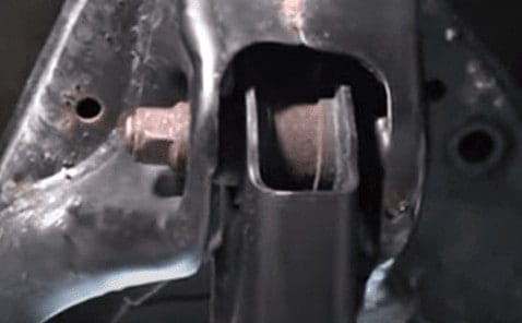 how to remove stuck strut bolt
