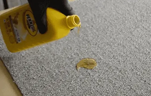 how to get motor oil out of trunk carpet