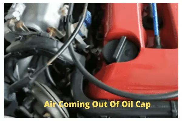 air coming out of oil cap